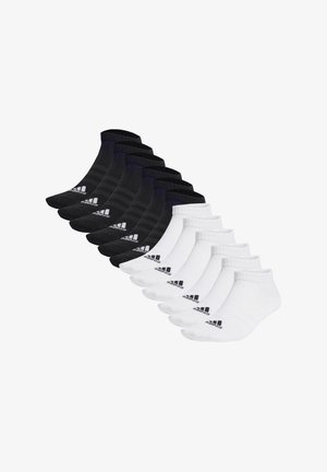 Diez pares de calcetines tobilleros en negro y blanco, con la parte superior de punto acanalado y el logo de Adidas en color contrastante en el lateral.