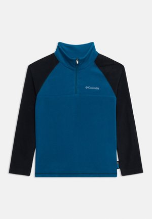 Pull polaire Columbia bleu et noir à manches longues, col haut et fermeture éclair avant au quart.