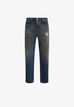 Jeans in denim blu scuro con taglio dritto, caratterizzati da rifiniture strappate e leggero sbiadimento su cosce e ginocchia.