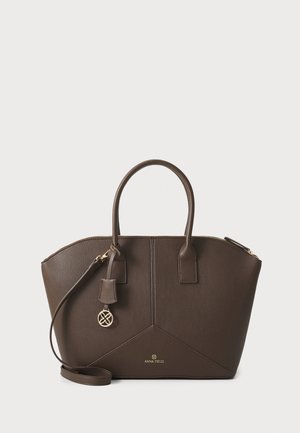 Brown synthetic leather handbag with dual handles, a detachable strap, gold-tone hardware, and a geometric design. Features logo detail.