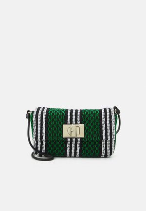 Rectangular woven handbag with green, black, and white stripes, featuring a gold-tone clasp and a thin black shoulder strap.