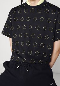 sandro T-shirt z nadrukiem