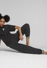Puma SQUAD - Camiseta estampada - black