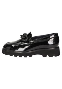 Black patent leather loafers with a chunky black sole, featuring a prominent decorative chain accent on the front.