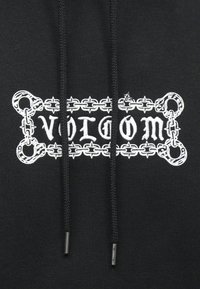 Hoodie noir avec un graphique blanc comportant un design de chaîne et de menottes entourant le mot "VOLCOM". Comprend des cordons avec des embouts en métal.