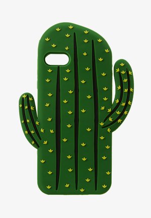 Green silicone phone case shaped like a cactus, featuring raised yellow flower accents and vertical stripes simulating cactus ridges.
