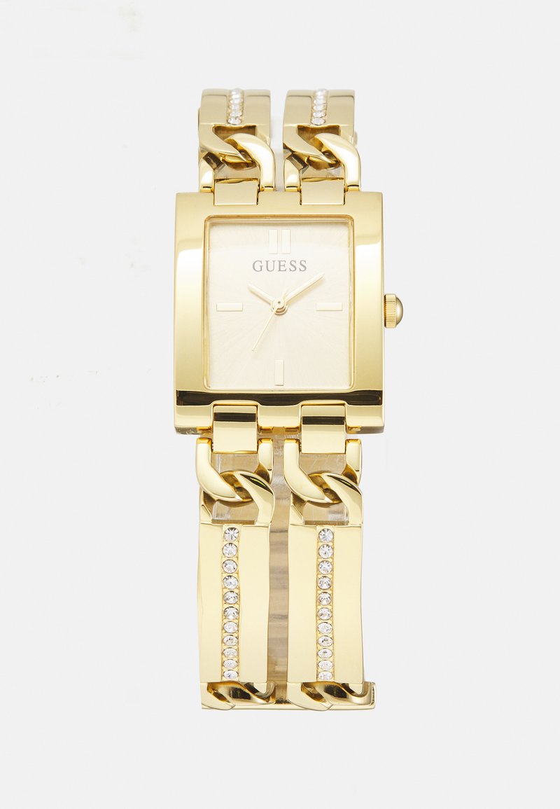 Montre en métal doré avec un cadran carré, design de bracelet à maillons et accents en cristal sur le bracelet. Cadran minimaliste avec des index horaires.