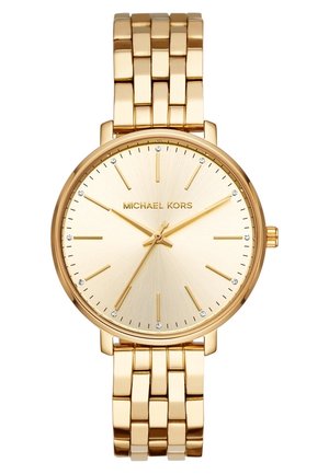 Montre-bracelet dorée Michael Kors avec cadran rond, repères horaires minimaux, trois aiguilles et bracelet en maillons métalliques. Pas de chiffres, accents de cristaux sur le cadran.