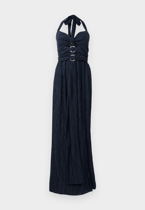 Navy blue pleated halter-neck maxi dress with ruched bodice and three decorative silver rings down the center front waist.