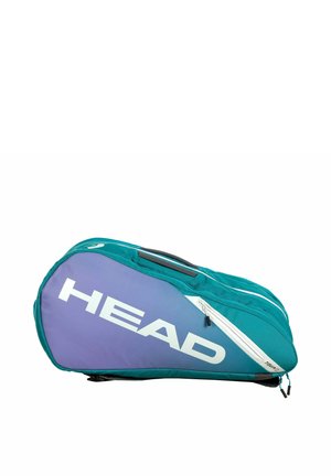 Teal en paarse HEAD merk tennistas met een bovenhandvat, witte ritssluiting en compacte, afgeronde vorm op een witte achtergrond.