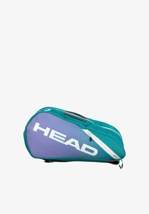 Teal und lila HEAD Marken-Tennistasche mit einem oberen Griff, weißem Reißverschluss und kompakter, abgerundeter Form vor weißem Hintergrund.