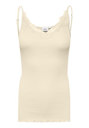 Beige ribbed tank top with lace trim, featuring adjustable spaghetti straps and a scalloped hem. Soft texture and fitted design.
