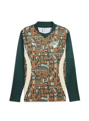 Long-sleeve soccer jersey featuring green fabric, orange abstract patterns, and cream side panels. Includes a logo on the front.