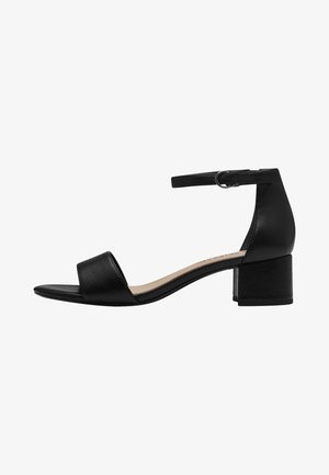 Schwarze Leder-High Heels Sandalen mit offener Zehenpartie, verstellbarem Knöchelriemen und Blockabsatz. Glatte Textur mit minimalistischem Design.