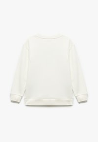 Felpa bianca con colletto rotondo, maniche lunghe e polsini a costine. Tessuto liscio, design minimalista, con taglio dritto nell'orlo.