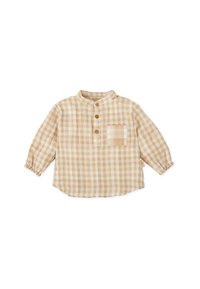 Camisa de manga larga con botones en un patrón de cuadros en beige y crema, con un pequeño bolsillo y puños elásticos, hecha de un tejido ligero.