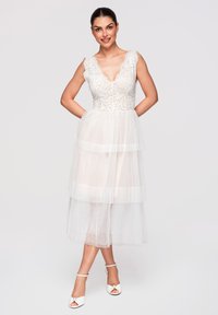 Sélectionné, white
