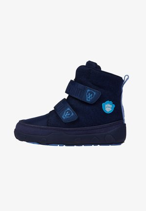 Botte d'hiver bleu foncé pour enfants avec deux brides Velcro ornées d'icônes d'ours et un logo "Affen Zahn" bleu sur le côté.