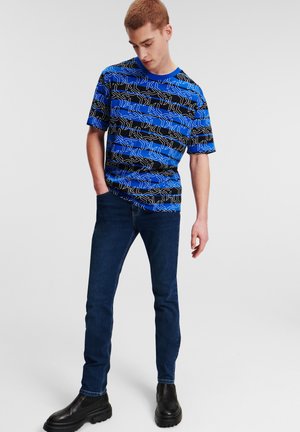 SKINNY - Slim fit jeans - washed dark blue