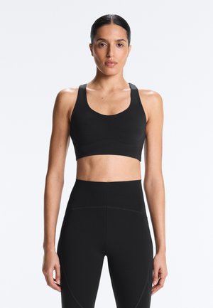 OYSHO COMPRESSIVE WITH CUPS - Sutien sport cu susținere medie - black