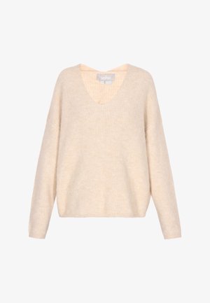 Bežový oversized sveter s hlbokým výstrihom do V, dlhými rukávmi a mäkkou, textúrovanou látkou s jemnými prúžkami. Viditeľná značka vo vnútri.