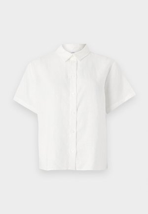 Camicia bianca a maniche corte in lino con colletto a punta e chiusura con bottoni. Presenta una vestibilità rilassata e una texture morbida.