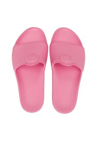 Sandali in gomma rosa con una ampia fascia sopra il piede e un motivo circolare in rilievo sulla fascia. Texture liscia e design aperto davanti.