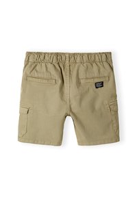 Beige katoenen shorts met een elastische tailleband, twee achterzakken en één zijvak. Gladde textuur en casual ontwerp.