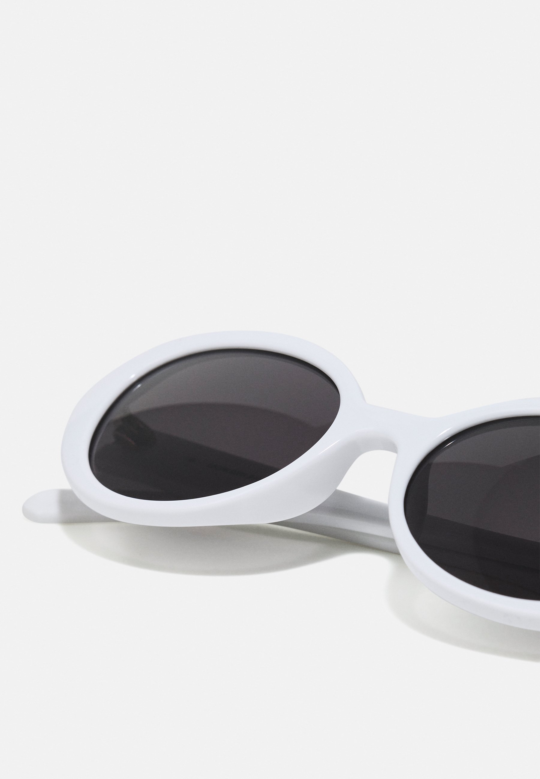 oval sunglasses white