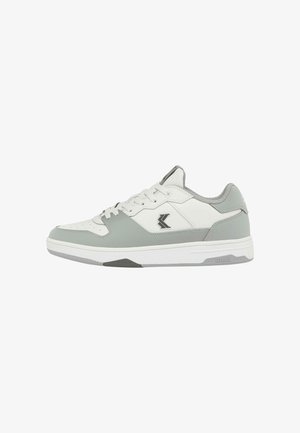 White and light grey sneaker with a smooth leather upper, mesh accents, padded collar, and a textured white rubber sole. Black logo detail included.