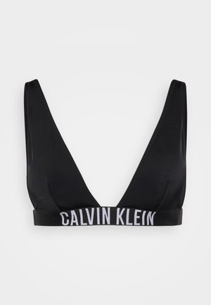 Bralette noir avec un décolleté en V profond, doté d'une large bande élastique avec le logo "CALVIN KLEIN" en blanc. Tissu lisse et extensible.