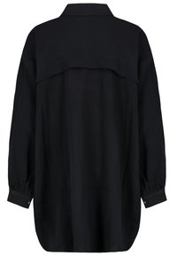 Black long-sleeve shirt with a back yoke, subtle textured fabric, curved hem, and buttoned cuffs. Designed for a relaxed fit.