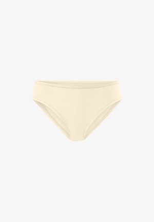 Mutanda beige da donna in stile bikini con vita elastica e cuciture minime su sfondo bianco.