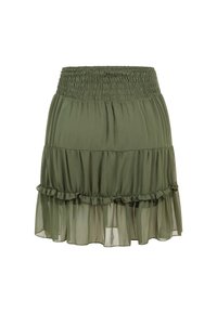 Jupe verte à volants avec taille élastique et ourlet froncé, en tissu léger semi-transparent.