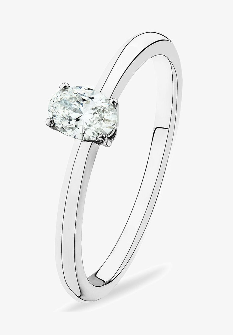 Sterling silver ring with a smooth, polished band and an oval, clear diamond setting secured by four prongs.