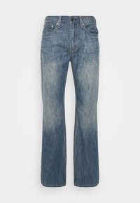 Levi's® 527™ SLIM BOOTCUT - Calças de ganga justas - medium chipped