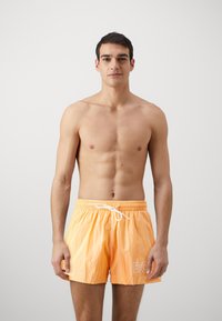 BOSS MOONEYE - Plavecké šortky - medium orange