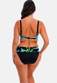 Dvoudílný bikinový komplet se vzorem modrých a zelených listů na vrchní části, černými kalhotkami s ladícím vzorovaným páskem. Nastavitelné ramínka.
