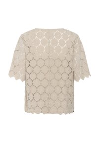 Blusa in pizzo beige con maniche corte, caratterizzata da motivi floreali intagliati, bordi ondulati e una vestibilità rilassata. Vista posteriore mostrata.