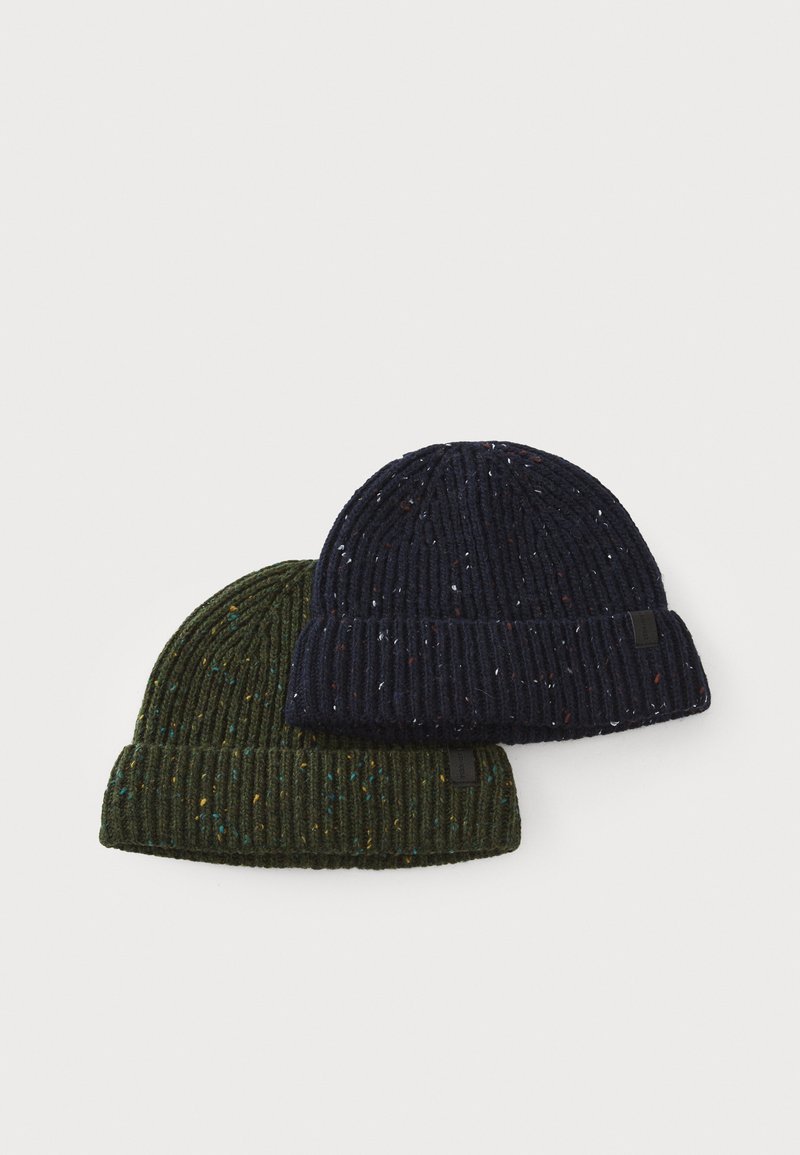 Two ribbed knit beanies: one dark green with multicolored specks and one navy blue with white flecks. Both have a folded cuff.