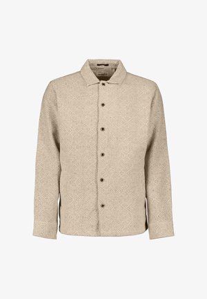 Veste beige texturée à manches longues avec boutons, petit col et poches avant, présentée sur un fond blanc.