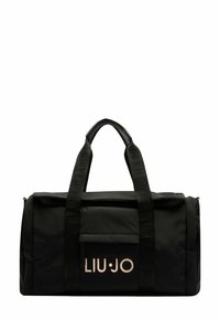 Sac de sport noir en nylon avec double poignées, doté d'une fermeture éclair sur le dessus, d'une poche à l'avant et d'un accent logo doré sur le devant.