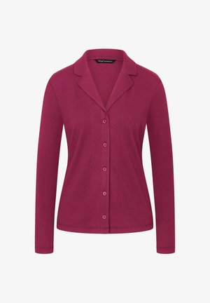 Langärmlige Strickjacke aus fuchsiafarbenem Rippenstoff, mit Reverskragen und Knöpfen an der Vorderseite, entworfen für eine taillierte Silhouette.