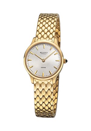 Montre dorée avec un bracelet en maille texturée. Le cadran argenté rond présente des index horaires surélevés et un motif en rayons de soleil texturé.