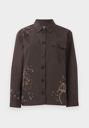 Brown button-up shirt with a collar, featuring floral and star embroidery in gold and blue, and a left chest pocket. Cotton material.