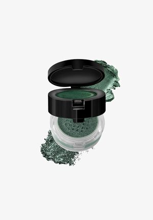 Vihreä irtopuuterosuudenväri pienessä kirkkaassa purkissa mustalla kääntyvällä kannella, vieressä näytteitä vihreästä kimaltavasta irtopuuterista.