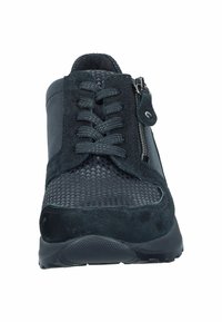 Black athletic shoes with textile and suede upper, featuring a textured design, laces, and a zippered side for easy access.