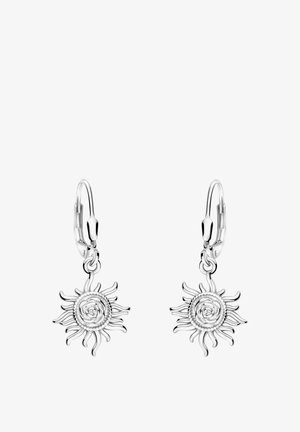 Boucles d'oreilles pendantes en forme de soleil argenté avec un centre tourbillonnant et des rayons ondulés, fixées à des attaches à charnière en forme de créoles.