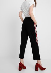 Topshop Kalhoty - black