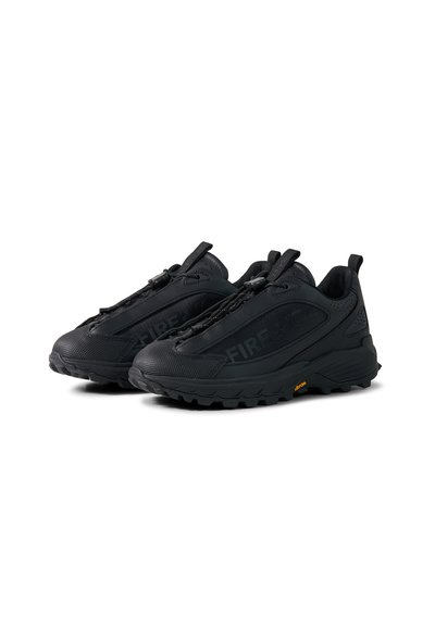 Pair of black athletic shoes with rugged soles, pull tabs, and elastic bungee laces, designed for outdoor or casual wear.